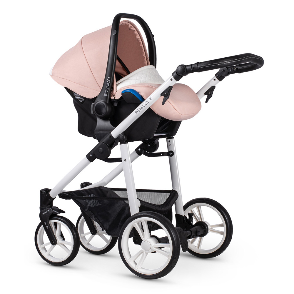 pink and white venicci pram